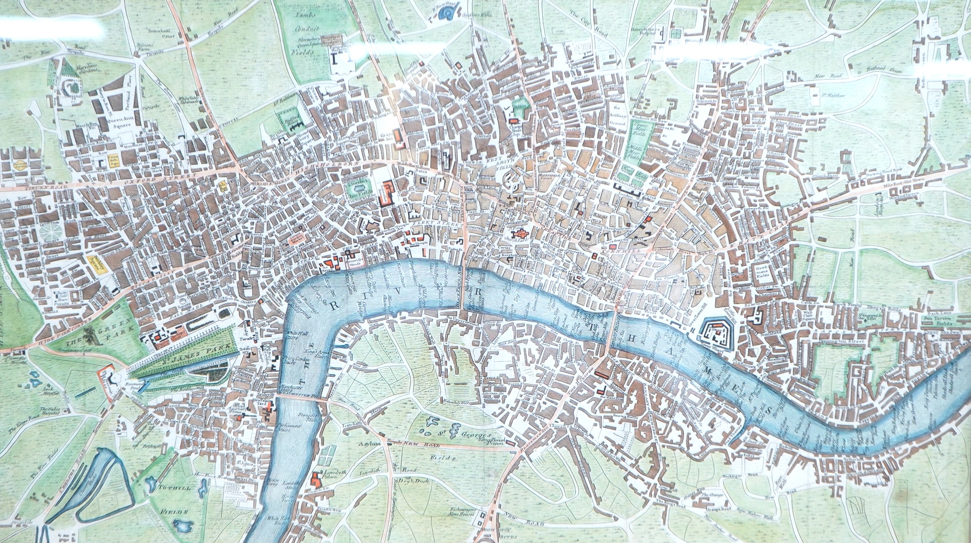 A framed folding coloured engraving of the map of London dated 1767, 31 x 51cm